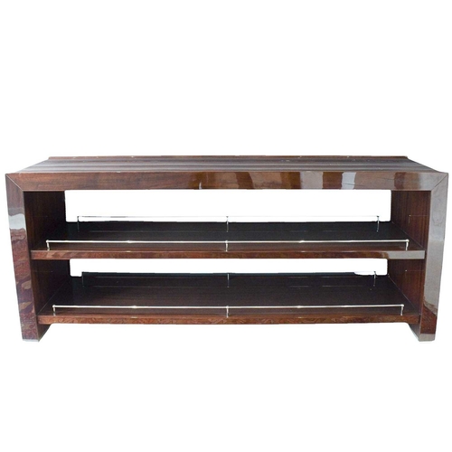 400 - ± Superyacht furnishings, a contemporary sideboard with chrome supports. Highly laquered dark wood v... 