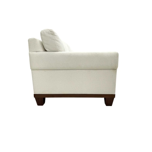 406 - ± Superyacht furnishings, a contemporary four/five seater sofa with white boucle fabric. On a highly... 