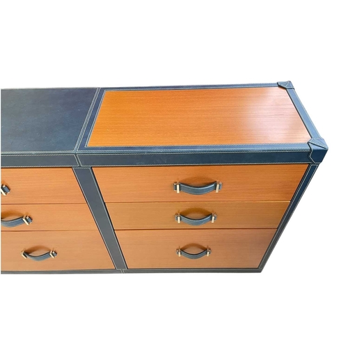 415 - ± Superyacht furnishings, a blue leather bank of nine-drawers Wood veneer front, two small drawers a... 