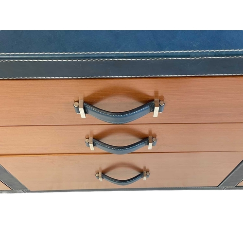 415 - ± Superyacht furnishings, a blue leather bank of nine-drawers Wood veneer front, two small drawers a... 