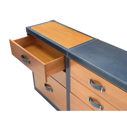 415 - ± Superyacht furnishings, a blue leather bank of nine-drawers Wood veneer front, two small drawers a... 