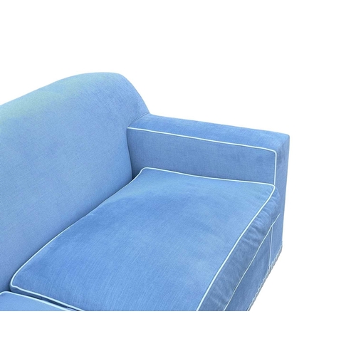 419 - ± Superyacht furnishings, a contemporary blue velour four/five seater sofa. Featuring a curved back ... 