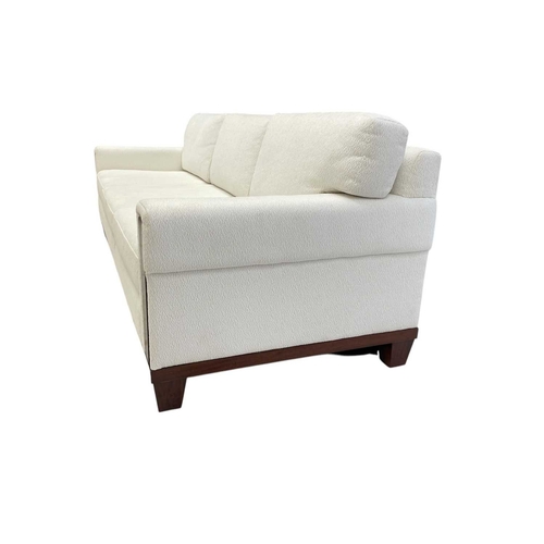 420 - ± Superyacht furnishings, a contemporary four/five seater sofa with white boucle fabric. On a highly... 