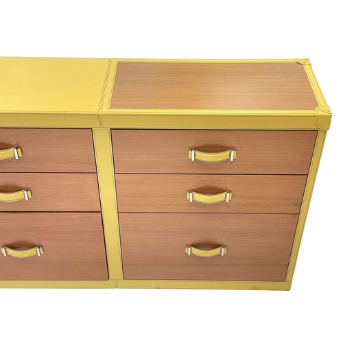 422 - ± Superyacht furnishings, a yellow leather bank of nine-drawers. Wood veneer fronts, two small drawe... 