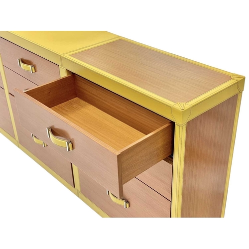 422 - ± Superyacht furnishings, a yellow leather bank of nine-drawers. Wood veneer fronts, two small drawe... 