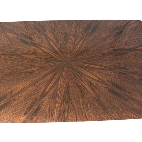 423 - ± Superyacht furnishings, a large contemporary table with chrome base. A highly laquered rosewood ve... 