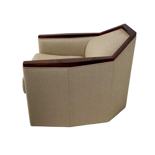 426 - ± Superyacht furnishings, a low armchair on a swivel base. High quality finish, featuring a neutral ... 