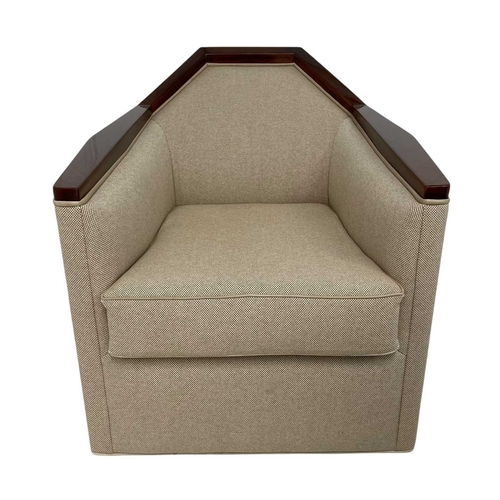 426 - ± Superyacht furnishings, a low armchair on a swivel base. High quality finish, featuring a neutral ... 