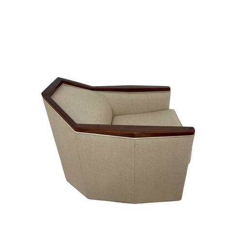 426 - ± Superyacht furnishings, a low armchair on a swivel base. High quality finish, featuring a neutral ... 