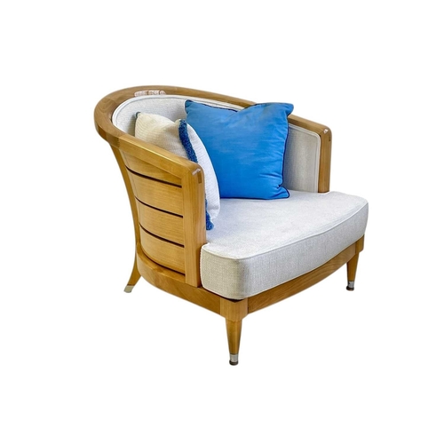 427 - ± Superyacht furnishings, a pair of upholstered chairs with curved backs. Laquered light wood veneer... 