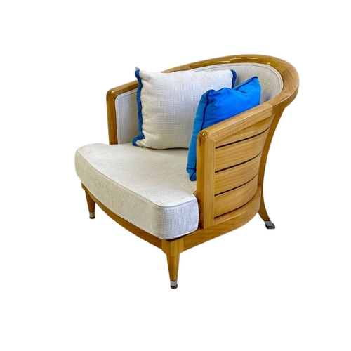 427 - ± Superyacht furnishings, a pair of upholstered chairs with curved backs. Laquered light wood veneer... 