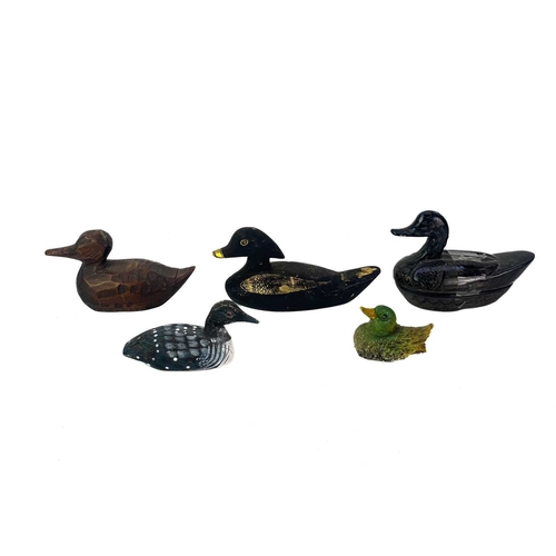 43 - A carved wood figure of a duck. Length 26cm, together with other wood, lacquered and resin figures o... 