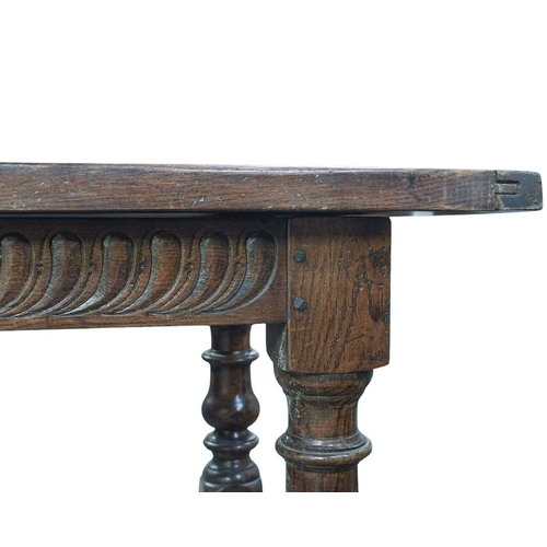 446 - An oak refectory dining table In the 17th century style, circa 1900, baluster turned square section ... 