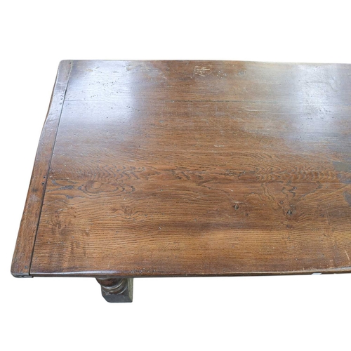 446 - An oak refectory dining table In the 17th century style, circa 1900, baluster turned square section ... 