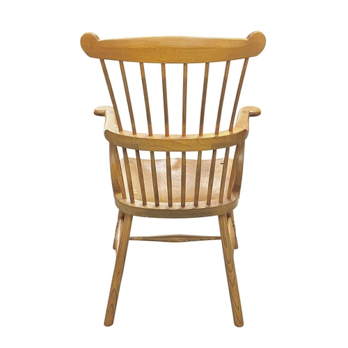 449 - A comb back ash and elm Windsor armchair by Peter Marshall. Circa 1960-70, stamped mark and monogram... 