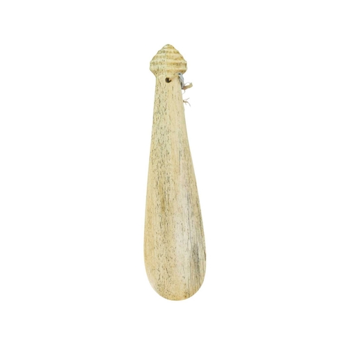 45 - A Maori bone hand club 'Patu Paraoa'. 19th century, of spatulate form with a carved hole above a rib... 