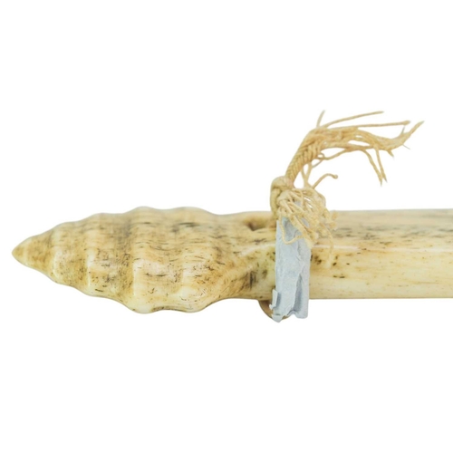 45 - A Maori bone hand club 'Patu Paraoa'. 19th century, of spatulate form with a carved hole above a rib... 