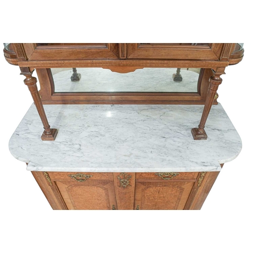 455 - A pair of French Second Empire style marble top cabinets. Circa 1900, veneered in walnut and amboyna... 