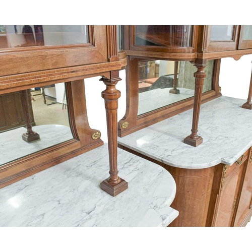 455 - A pair of French Second Empire style marble top cabinets. Circa 1900, veneered in walnut and amboyna... 