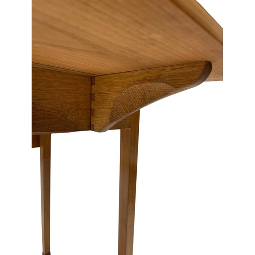 464 - A contemporary cherry and walnut Pembroke table, in the Arts and Crafts tradition. Fitted with an en... 