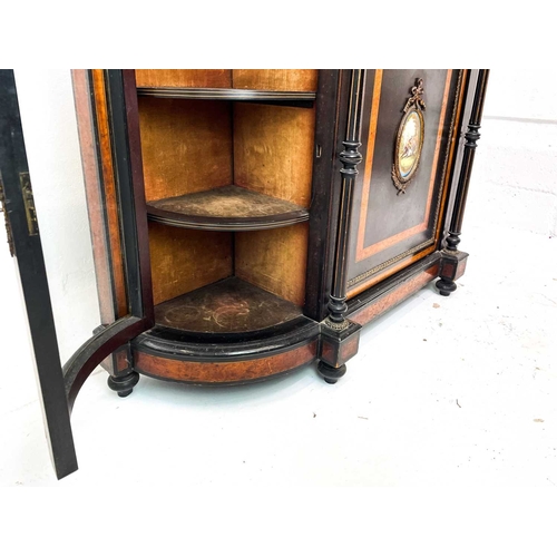 465 - A Victorian ebonised, amboyna banded, and gilt metal mounted credenza. The panel door inset an oval ... 