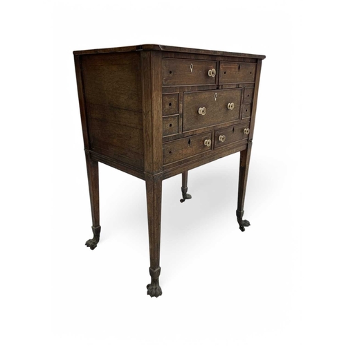 466 - A remarkable Regency rosewood toilet and work table. With boxwood stringing and fitted an arrangemen... 