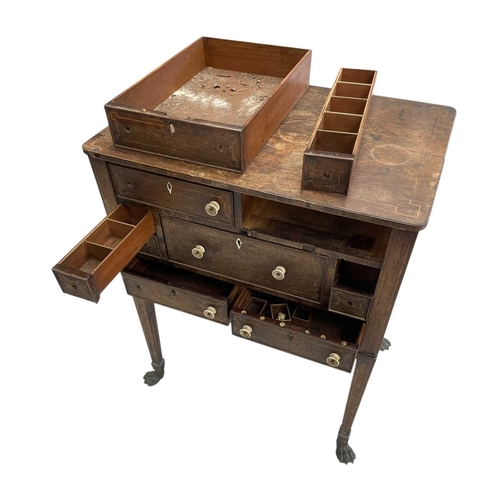 466 - A remarkable Regency rosewood toilet and work table. With boxwood stringing and fitted an arrangemen... 