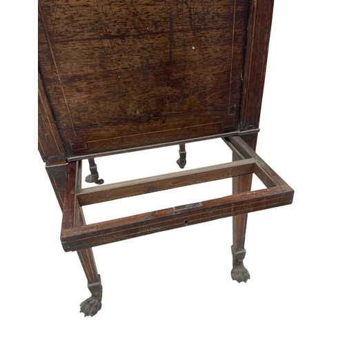 466 - A remarkable Regency rosewood toilet and work table. With boxwood stringing and fitted an arrangemen... 