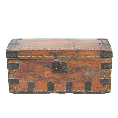 468 - A stud decorated pine dome top trunk. With iron hardware and a floral paper lined interior, width 88... 