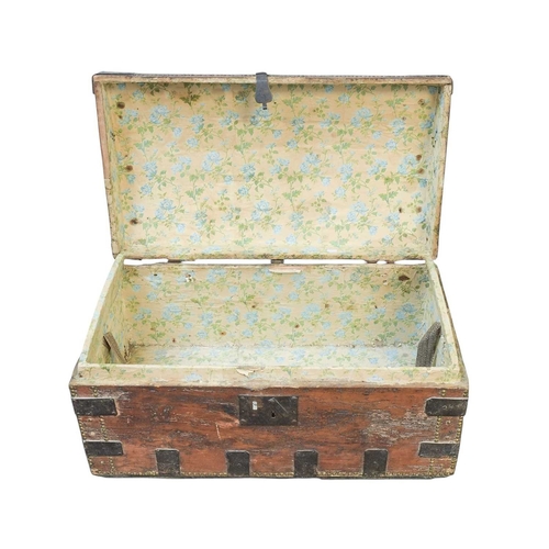 468 - A stud decorated pine dome top trunk. With iron hardware and a floral paper lined interior, width 88... 