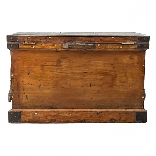 475 - A large iron bound carpenter's chest. Late 19th century, possibly for a ship's carpenter, with rope ... 