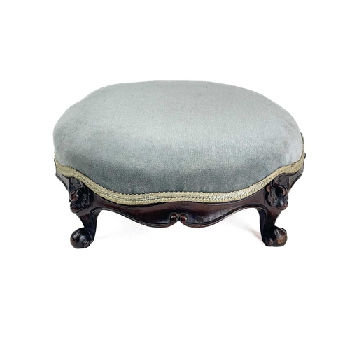 477 - A pair of Victorian rosewood framed circular footstools. With padded tops on cabriole legs with scro... 