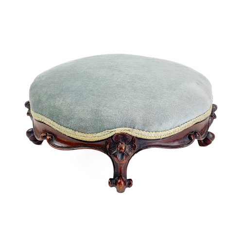 477 - A pair of Victorian rosewood framed circular footstools. With padded tops on cabriole legs with scro... 