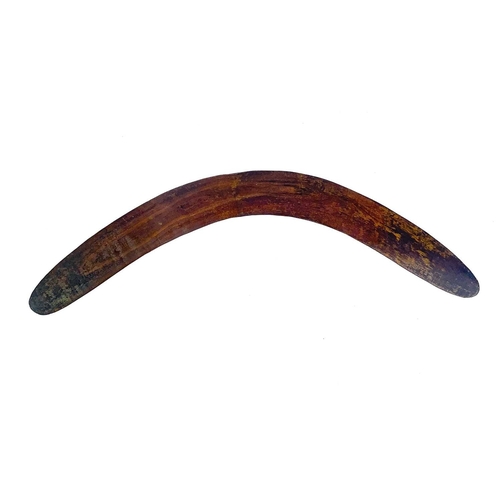 48 - An aboriginal hardwood boomerang. With incised kangaroo decoration, length 70.5cm.