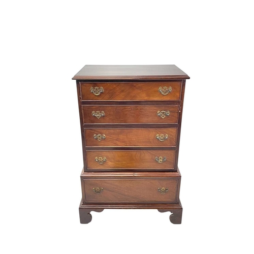 482 - A mahogany dwarf chest on stand. Circa 1920, the upper part with four long drawers, the base fitted ... 