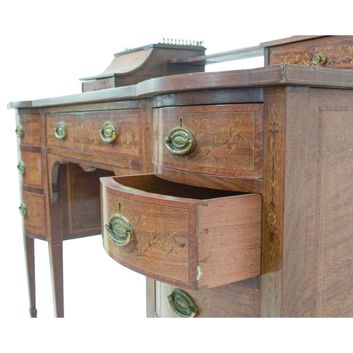 484 - A late Victorian mahogany and inlaid writing desk. The galleried superstructure with lift front comp... 