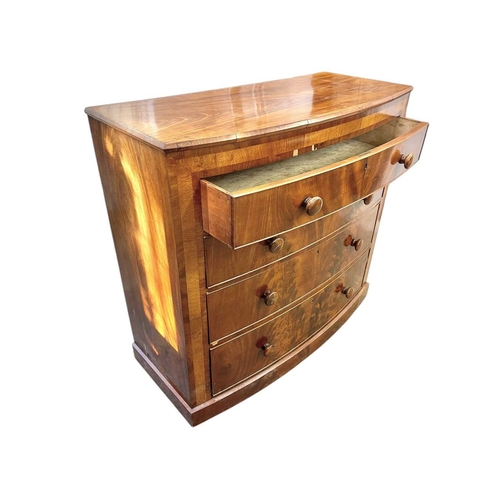 485 - A Victorian mahogany bow front chest. Fitted four graduated long drawers, on a plinth base, height 1... 