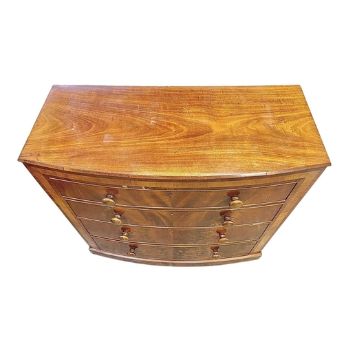 485 - A Victorian mahogany bow front chest. Fitted four graduated long drawers, on a plinth base, height 1... 