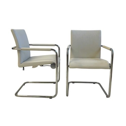 494 - Six Hulsta white leather dining chairs. Chrome tubular frames, white leather upholstered seats and a... 