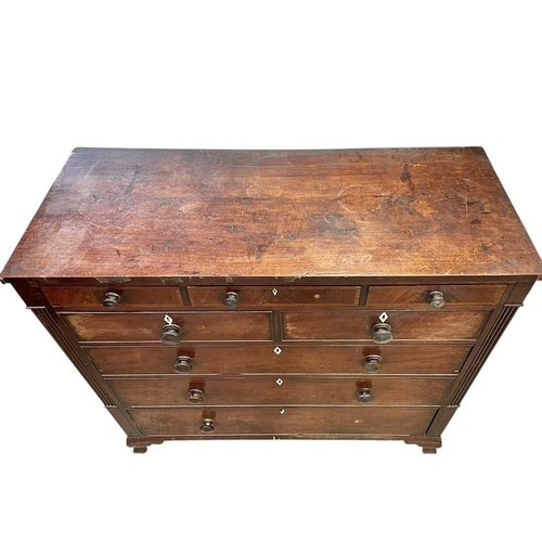 495 - An early Victorian mahogany chest. Fitted three narrow frieze drawers above two short and three long... 