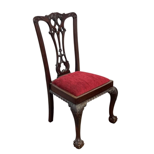 499 - A set of four Edwardian mahogany 'Chippendale' dining chairs, and two similar. With pierced vase spl... 