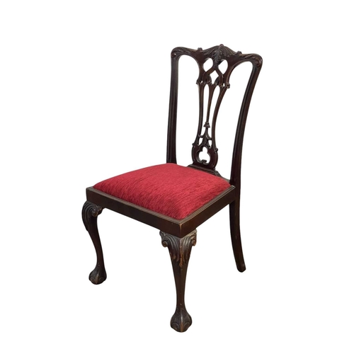 499 - A set of four Edwardian mahogany 'Chippendale' dining chairs, and two similar. With pierced vase spl... 