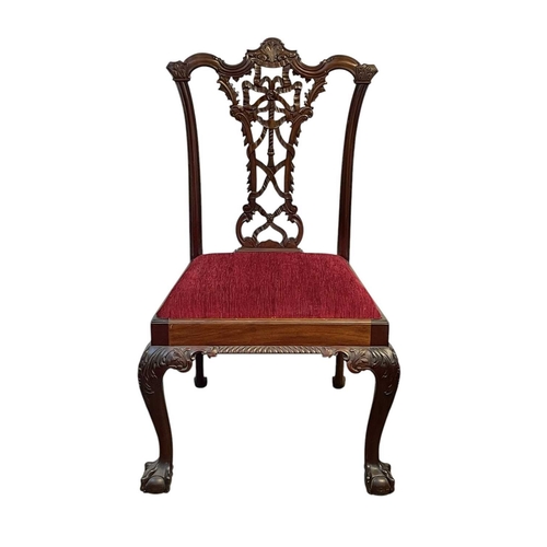 499 - A set of four Edwardian mahogany 'Chippendale' dining chairs, and two similar. With pierced vase spl... 