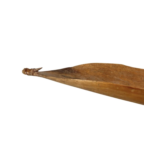 5 - An Aboriginal woomera. (Spear thrower), with an integral hook, length 72cm.