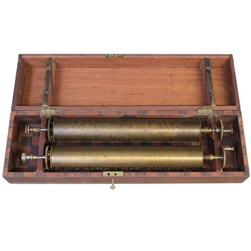 50 - A Nicole Freres figured walnut and banded cylinder music box on a stand. Late 19th century, stamped ... 