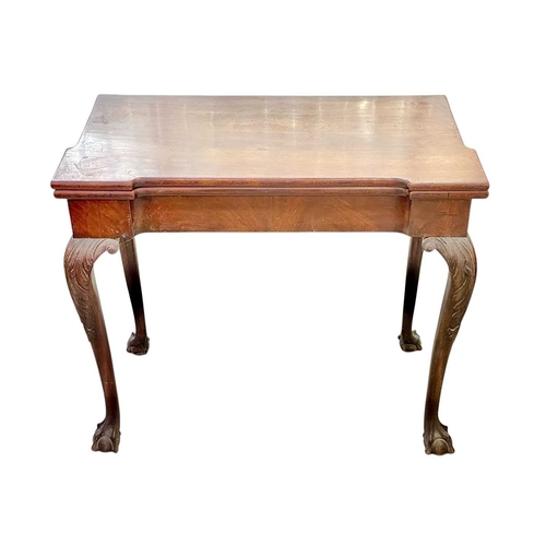 500 - A George III mahogany fold-top tea table. The swivel top was originally supported by a gate leg acti... 