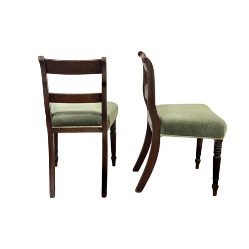 504 - A set of eight George IV mahogany dining chairs. With bar backs, reeded uprights, and stuffover upho... 