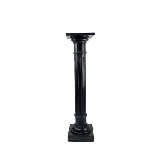 506 - A Victorian ebonised torchere. With a gilt metal mounted fluted column, on a square base, height 107... 