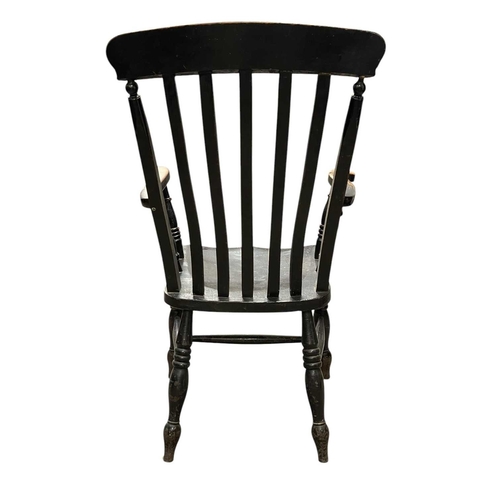 513 - A painted beech and ash kitchen Windsor armchair. With a lath back, solid seat on turned legs, heigh... 