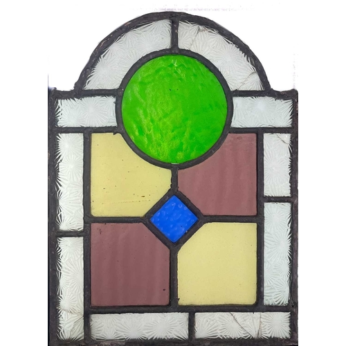 52 - A group of three Edwardian arched stained and leaded glass panels. 1: Each 31X23cm, together with a ... 